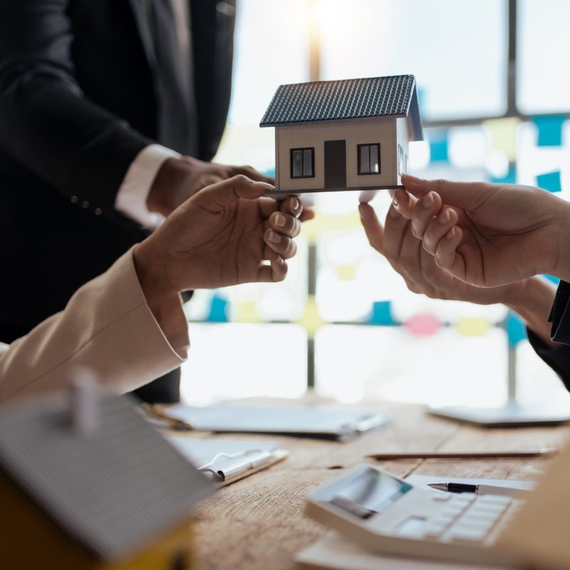 Business people meeting together about real estate. Working as a teamwork of real estate businesses.